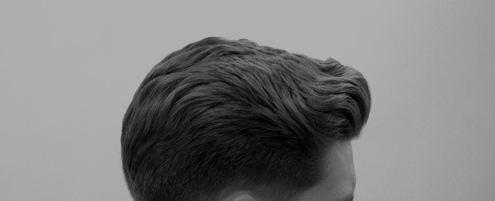Man with short wavy hair